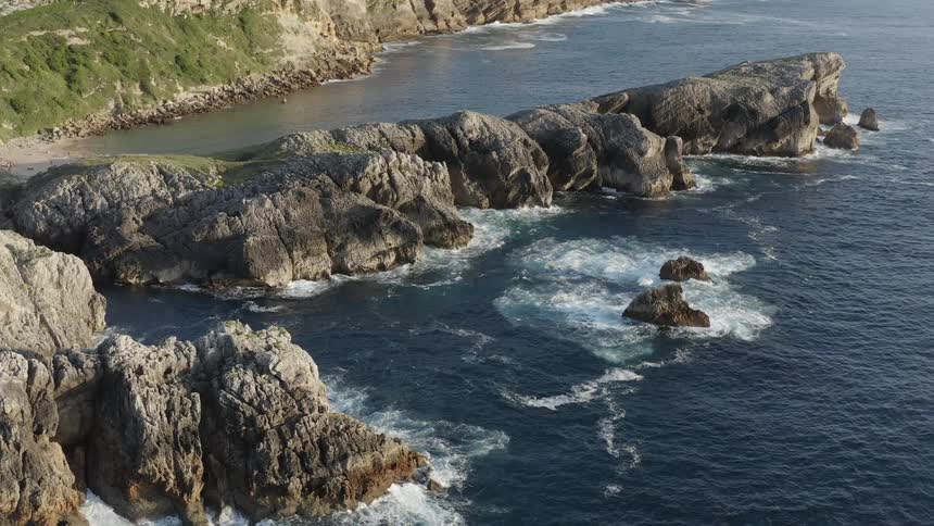 Aerial view of cliff and small island in the Spanish Atlantic coast
