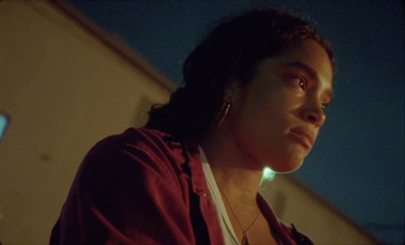 A woman looks worried outside