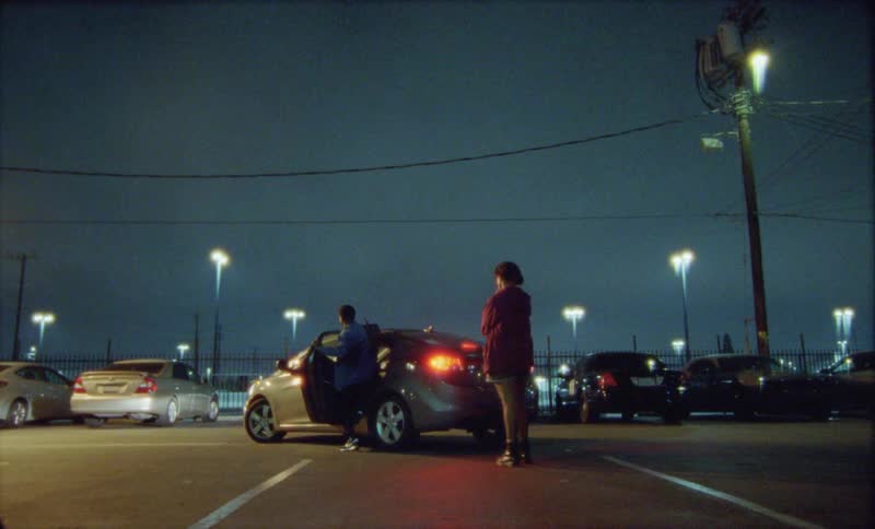 Two friends are hugging each other at night time
