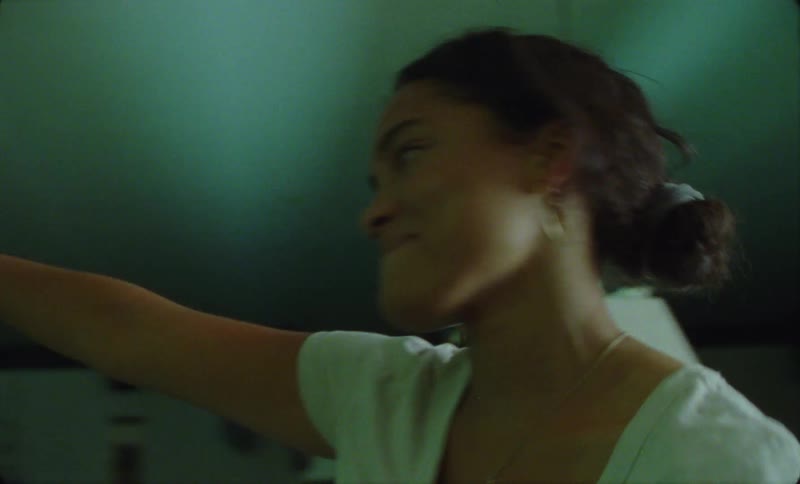 A man and woman dancing indoors