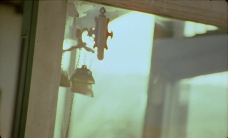 Bells on a door ring as the door opens announcing a customer