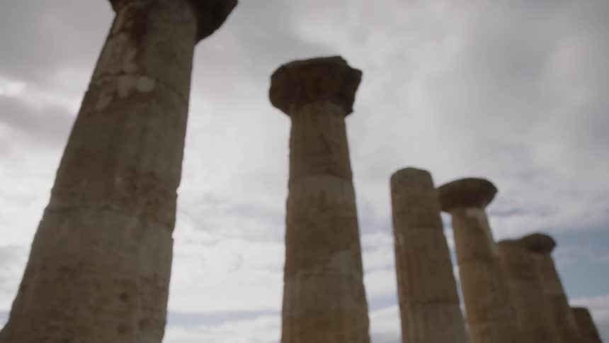 The remnants of a coliseum in the daytime