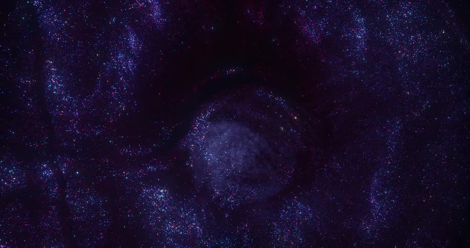 A burst of blue glitter expands in circles