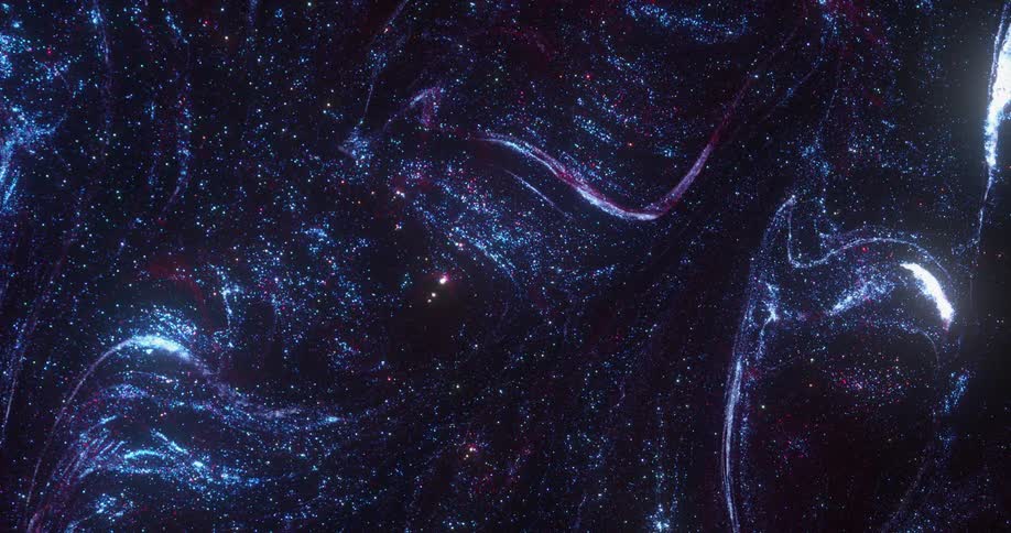 A glittery liquid substance is shimmering as it moves around