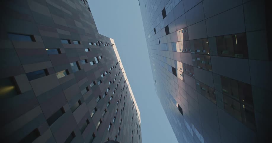Exterior view of office buildings against the blue sky