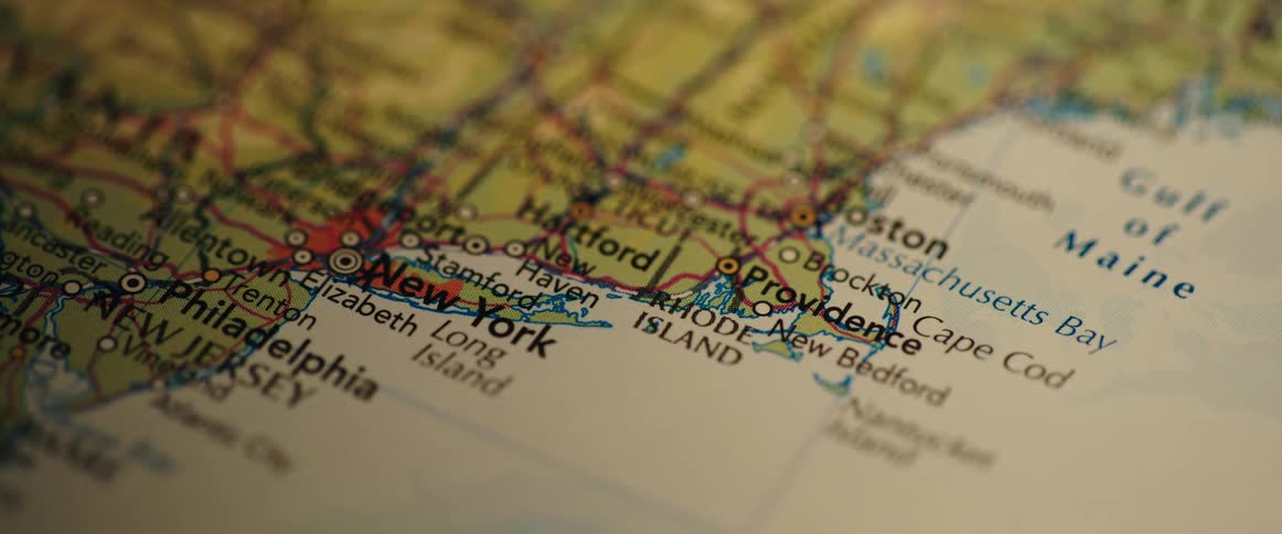 Extreme close up of a paper map showing the coast of new york