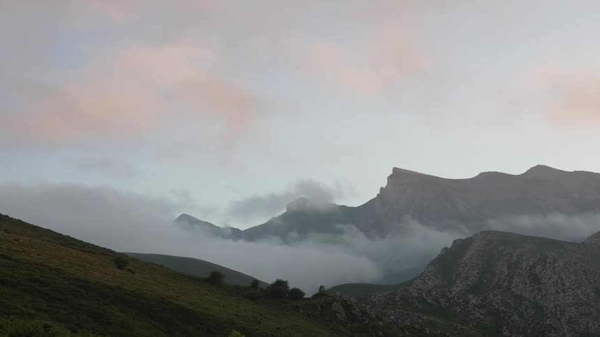 The Cantabrian mountain range surrounded by clouds at dusk