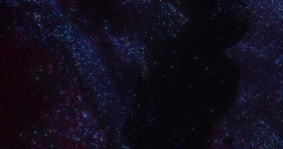 Blue and purple pinpoints of light glitter like stars in the darkness moving in rippling space