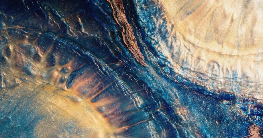 Two rounded shapes are sitting at the corners and the blue substance underneath is rippling and moving outward and meets in the middle and form a ridge