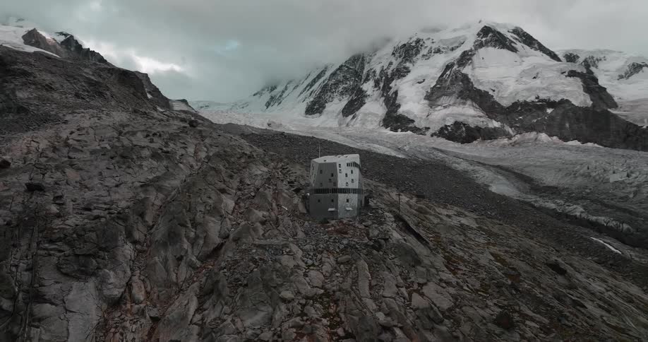 A single building located in snowy mountains