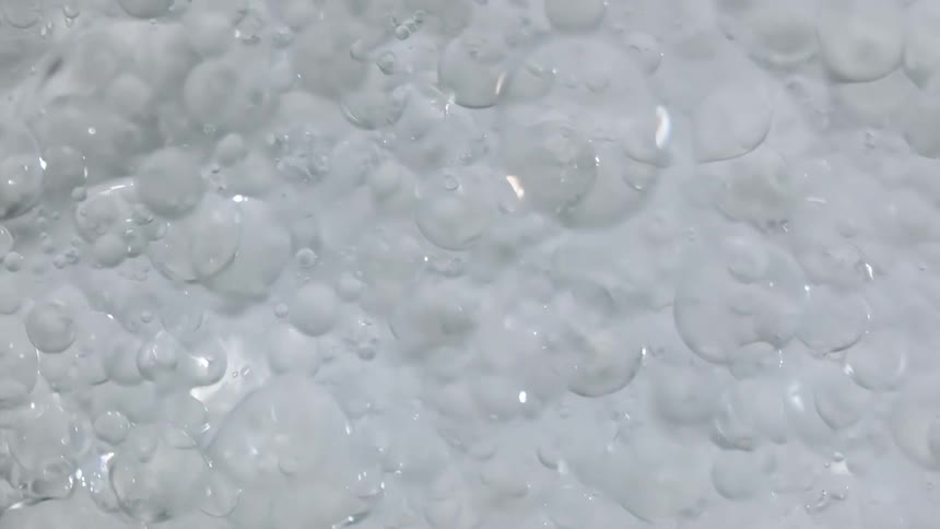 Flowing droplets of clear liquid