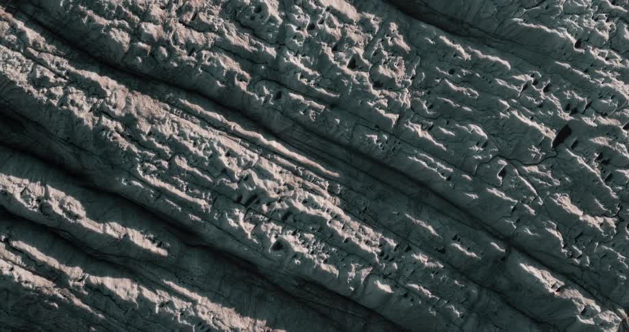Light shines on rocks showing their texture