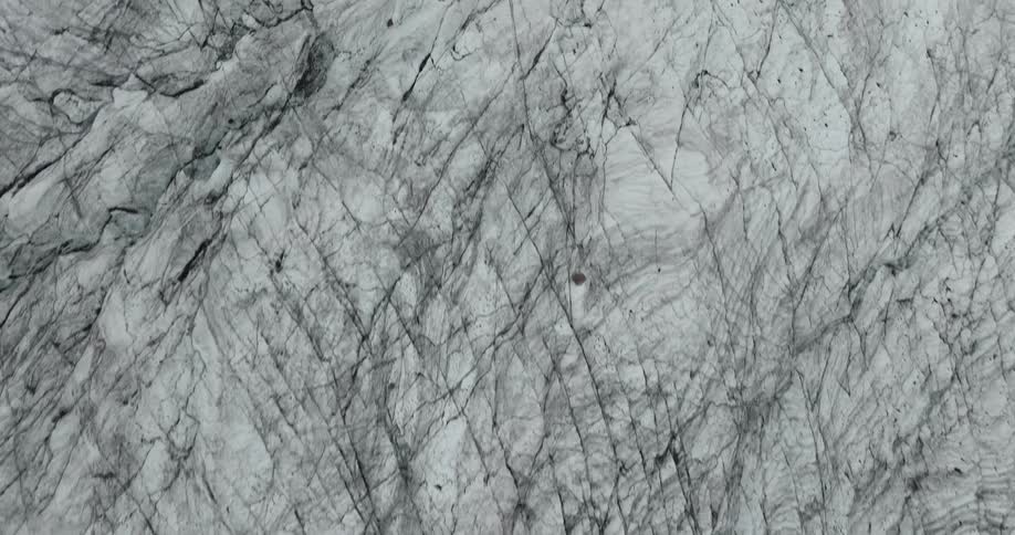 Top down aerial view of jagged surface of a glacier