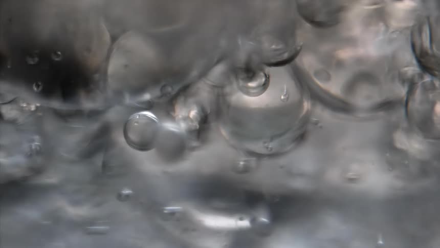 Flowing droplets of clear liquid
