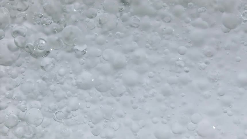 Flowing droplets of clear liquid