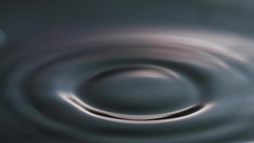 A close up of a drop of water