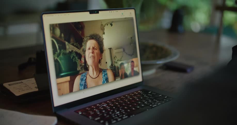 People talk on a video call on a laptop