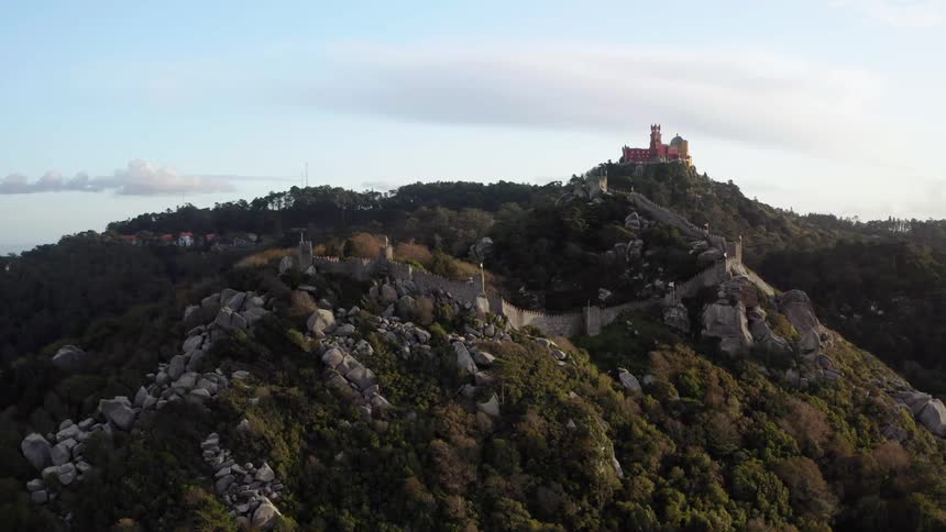A castle is at the top of the mountain