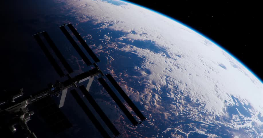 A satellite flies in space near the planet earth