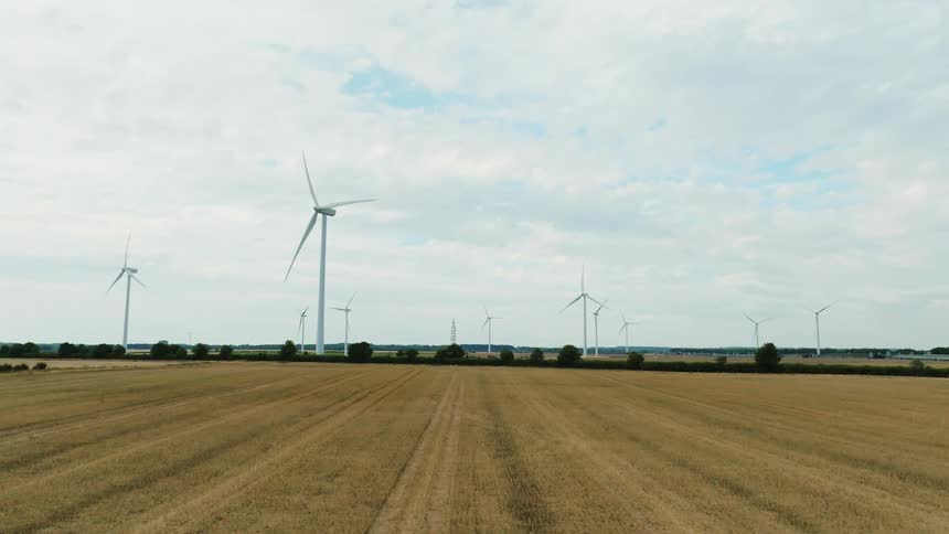Wind turbines use the power of the wind to create electricity on wind farm