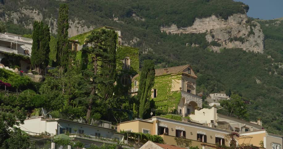 Large homes sit along the slope of a mountain