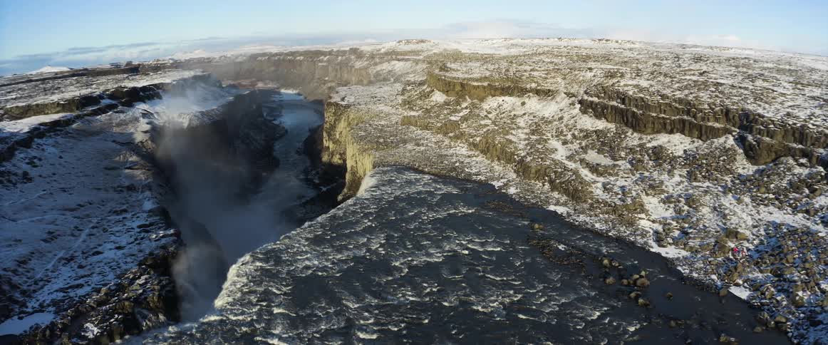 An aerial view of rocks and a hill