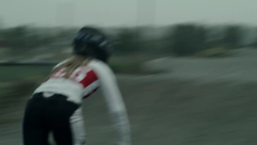 A person riding a bmx bike outdoors