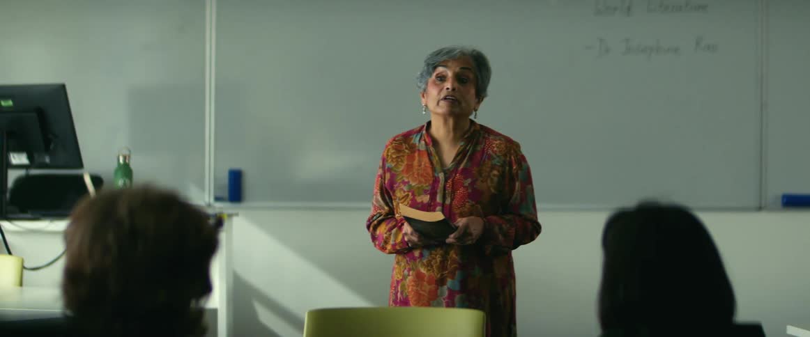 A woman is teaching class