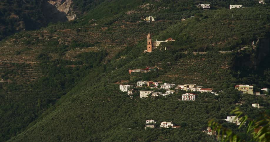 A small village is spread out on a mountain in the forest