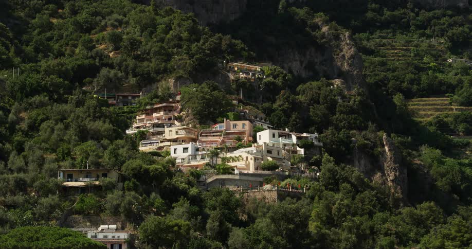 Small village on the slopes of a mountain at daytime