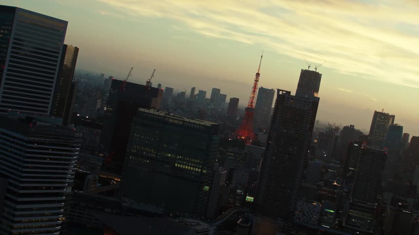 The sun is rising on the city