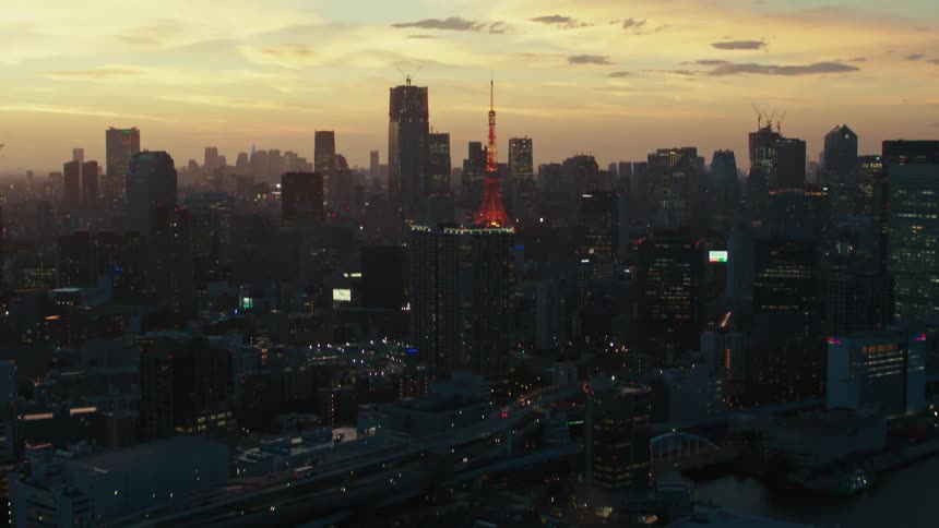 Aerial view of the tokyo communication and observation tower on the city skyline at evening