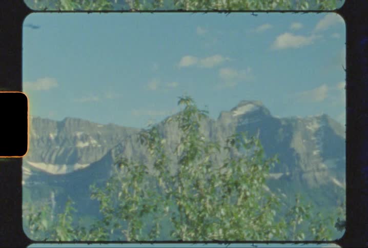 Mountains peaks of glacier national park shot on 8mm film