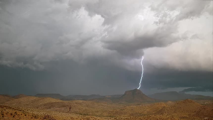 Lightning flashing in a cloudy sky during a storm