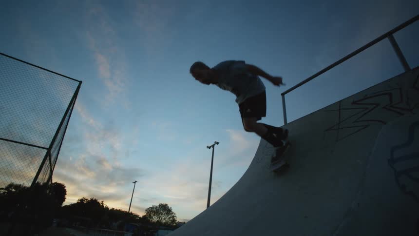 A man skateboarding outdoors