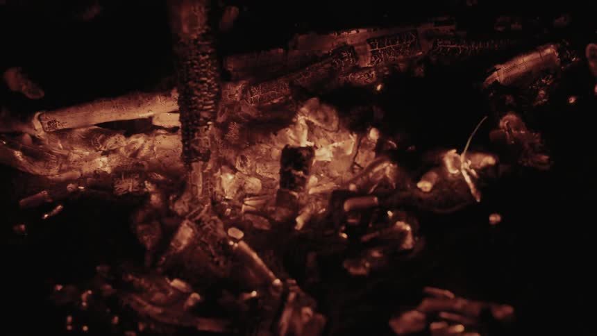 The embers of a fire burning