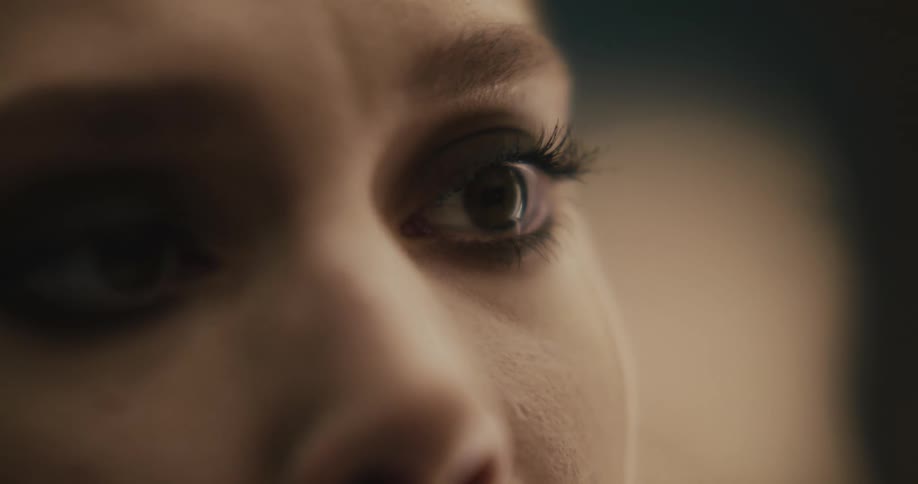 Close up of woman looking into space