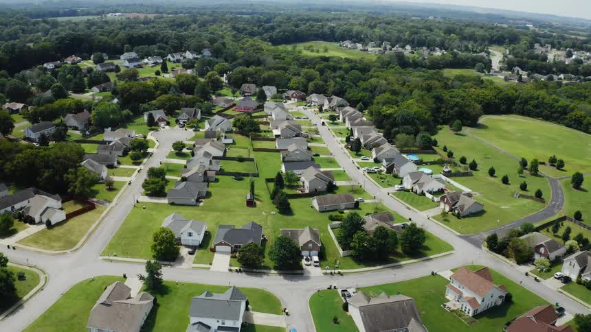 An aerial view of homes in a suburban neighborhood