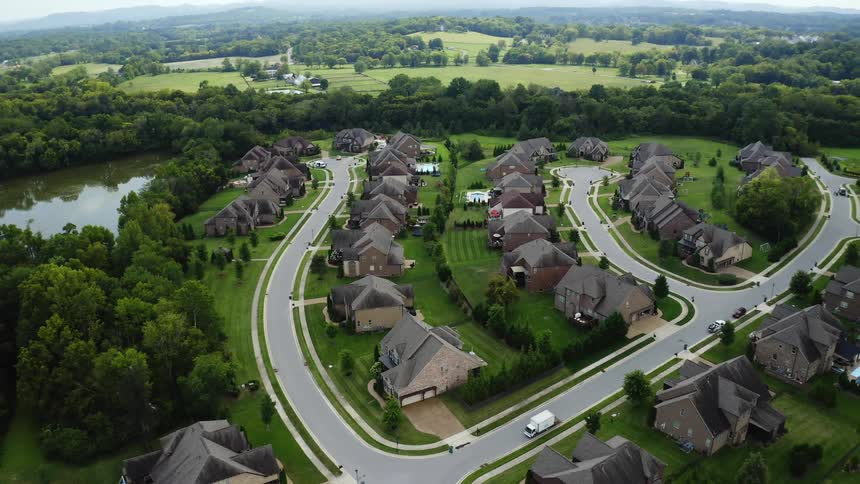 An aerial view of rows of homes in the suburbs