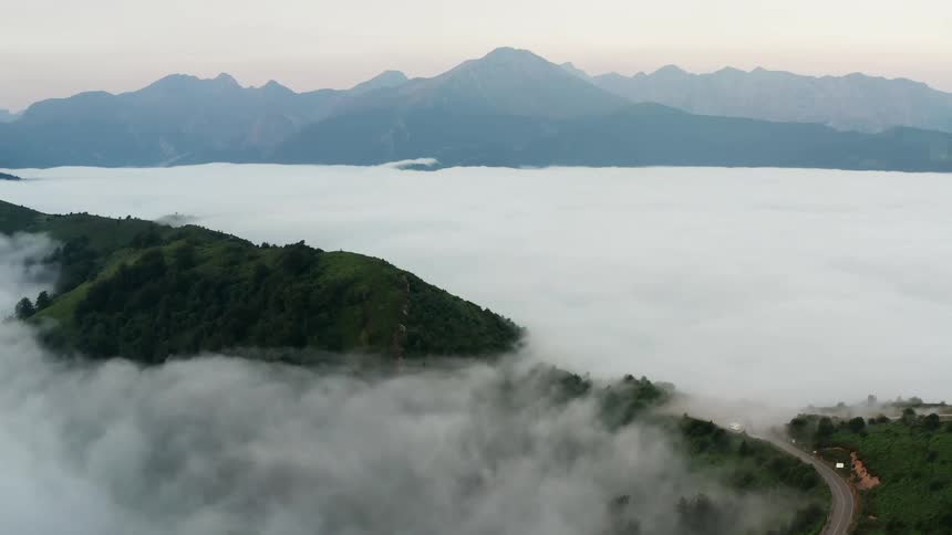 Mountain peaks are breaking through the sea of clouds