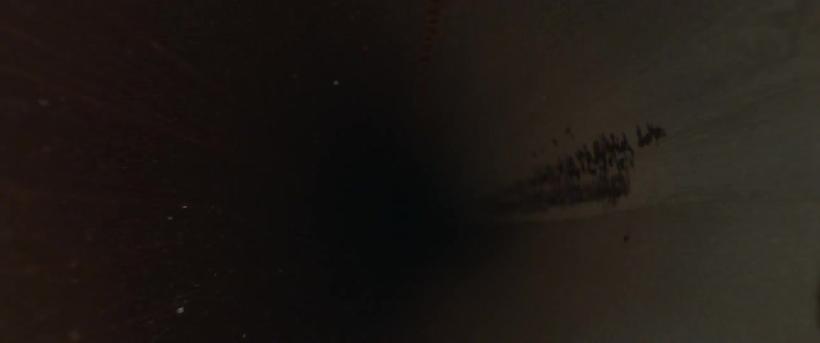 A gold sphere surrounded by darkness