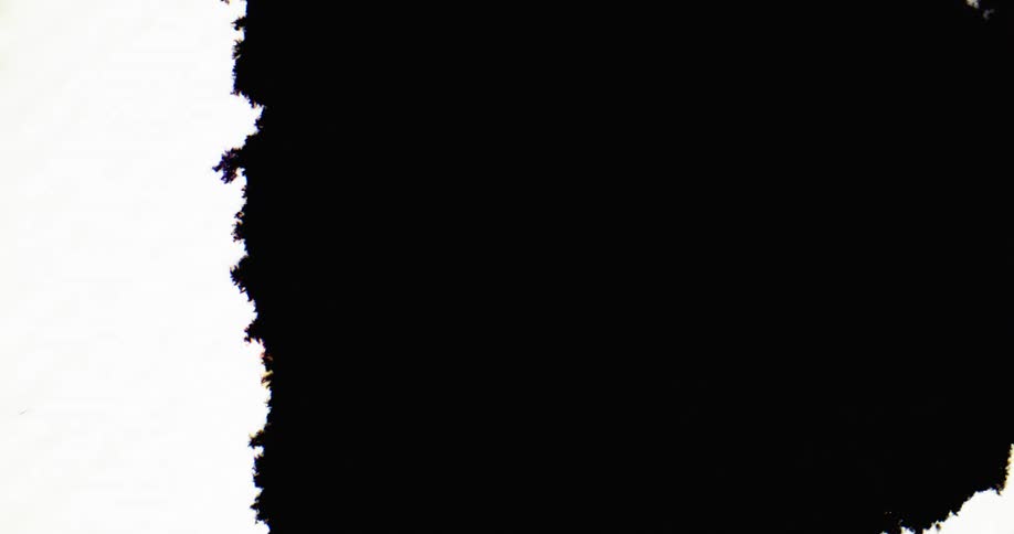 A black inkblot spreads further left