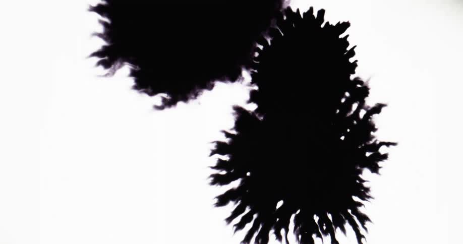 Black ink spreads like a spiky certain