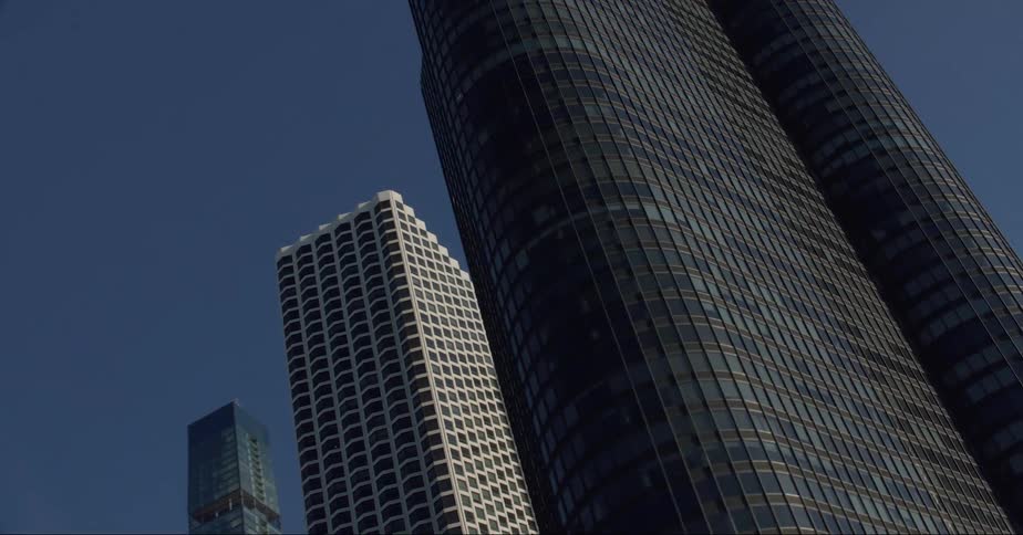 Chicago city skyscrapers against a bright blue sky