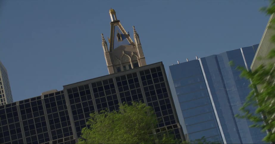 The tower of 680 north lake shore drive in chicago stands above other city buildings