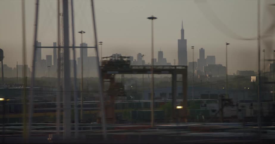 City skyscrapers and skyline visible from highway traffic