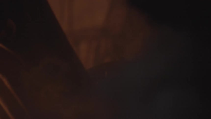 A person is spinning a lever