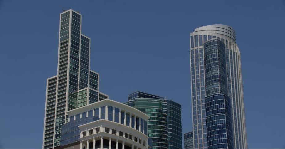 Tall buildings in a metropolis during the day