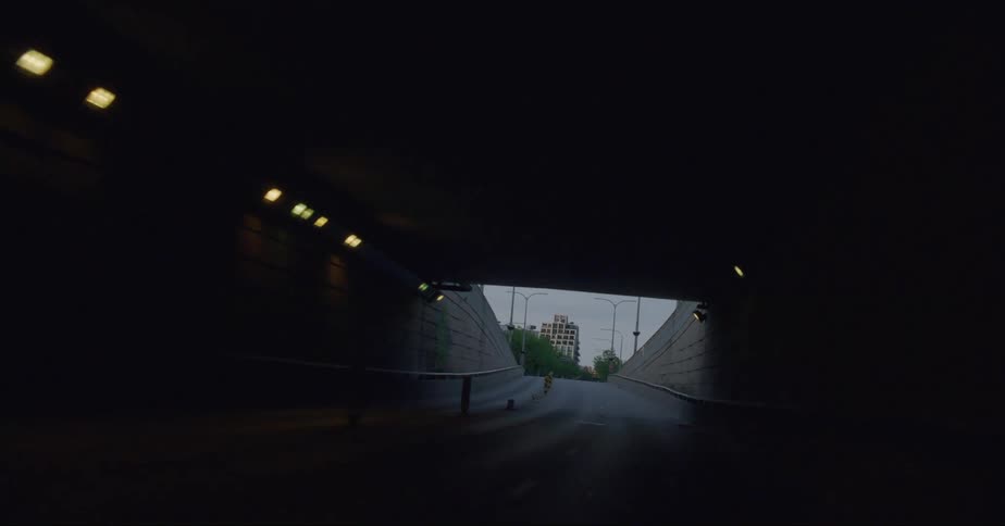 Past the dark tunnel is a town