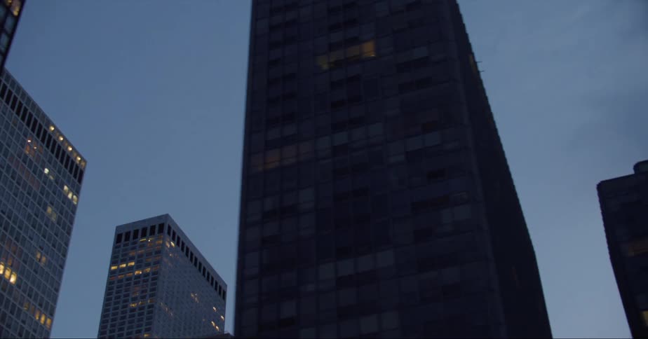 Apartment lights come on in high rise buildings at night